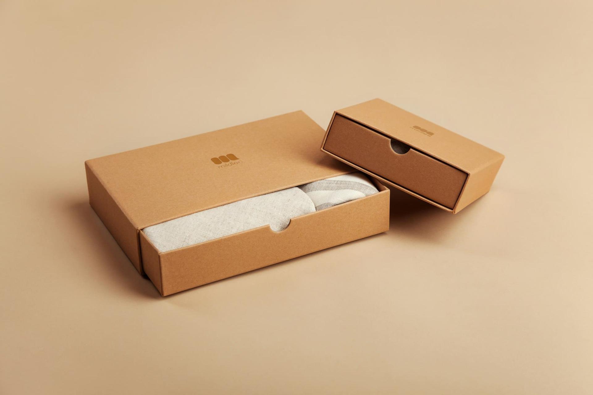 An open kraft-board presentation box with tissue inside